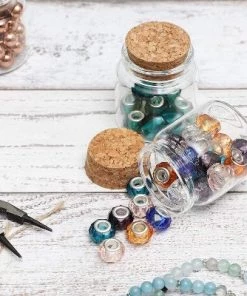 Bright Creations 12 Pack Glass Jars Storage Cork Bottles with Lid Holds 50ml for Party Favors, 1.3 x 2.1 Inches, Clear