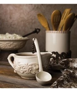 GG Collection Cream Ceramic Utensil Holder with Acanthus Leaf Metal Base